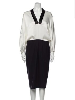 Elegant Black and White Sheath Dress with V-Neck Detail